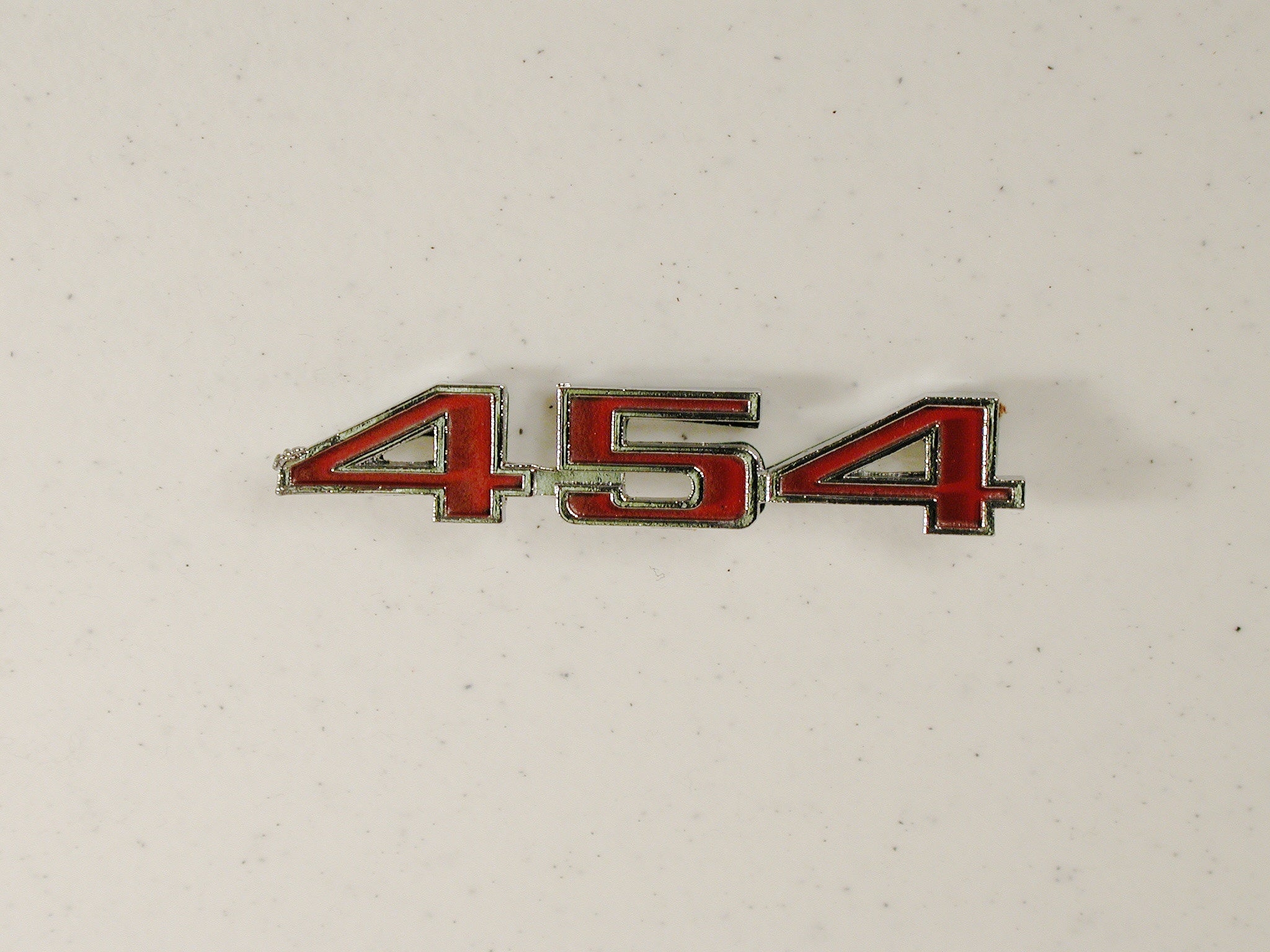GM-NOS Hood 454 Emblem 73-75 / Product Number: EM140 | The Spindle People