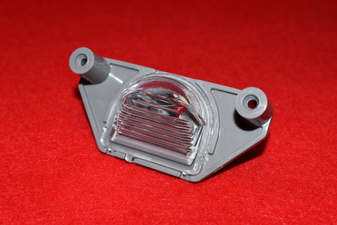 1988 - 1996 Corvette Rear License Plate Light  /  Product Number: LM172