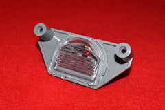 1988 - 1996 Corvette Rear License Plate Light  /  Product Number: LM172